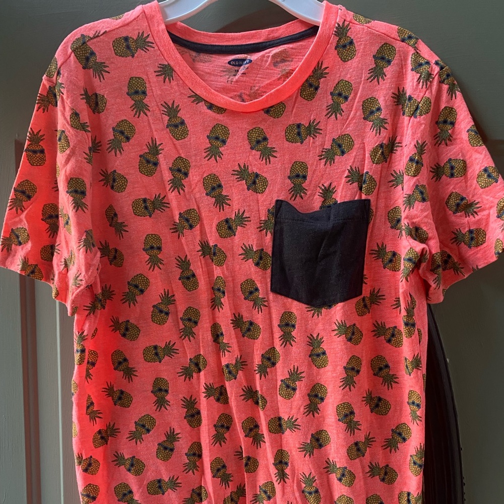 Boys old navy shirt. Neon orange in color with pineapple print. Size is XXL (18)